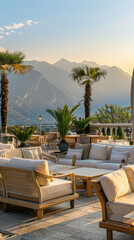 Obraz premium Outdoor furniture on a palmfilled patio, with mountains in the background. Generative AI