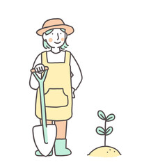 苗を植え付けている女性