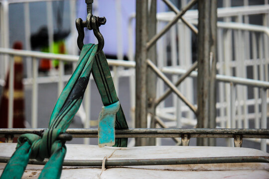 Green sling for lifting heavy items