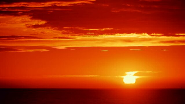 Time lapse of sunrise over sea. Sun rising above horizon. Nature landscape. Seascape in Spain.