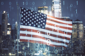 Double exposure of abstract virtual binary code hologram on USA flag and blurry skyscrapers...