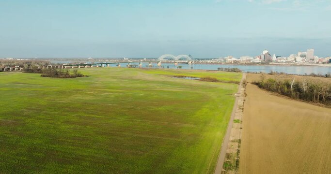 Big River Trail At Dacus Lake Road Trailhead Overlooking Hernando do Soto Bridge In Arkansas, USA. Aerial Drone Shot