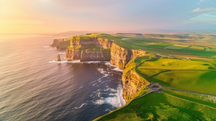 World famous Cliffs of Moher, one of the most popular tourist destinations in Ireland. Aerial view of known tourist attraction on Wild Atlantic Way in County Clare. - obrazy, fototapety, plakaty