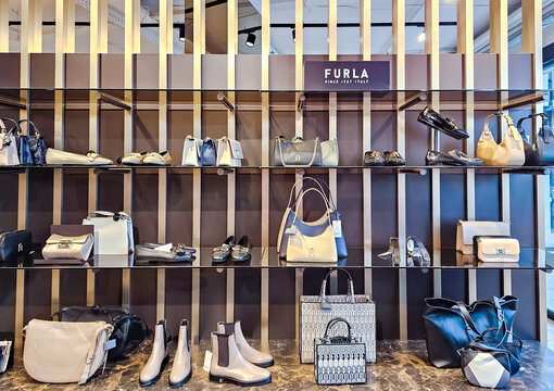 LATVIA, RIGA, 15, MARCH, 2024: Modern interior of Furla boutique with a large collection of bags and shoes in Stockmann shopping mall, Riga. Latvia