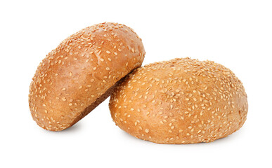Two fresh hamburger buns with sesame seeds isolated on white