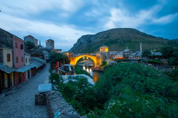 Tuinposter Stari Most Mostar, Bosnia and Herzegovina. The Old Bridge, Stari Most, with emerald river Neretva.