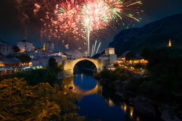 Papier Peint photo Stari Most Mostar, Bosnia and Herzegovina. The Old Bridge, Stari Most, with emerald river Neretva.