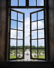 Looking at the royal gardens through the windows in Drottningholm palace in Stockholm, Sweden