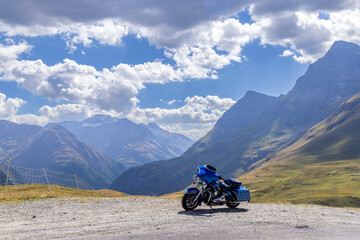 Motorbike on Route des Grandes Alpes near Col de l'Iseran, Savoy, France