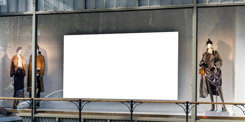 Horizontal advertisement billboard mounted above boutique store window display with fashion...
