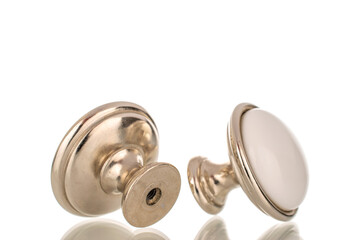 Two metal handles for furniture, macro, isolated on white background.