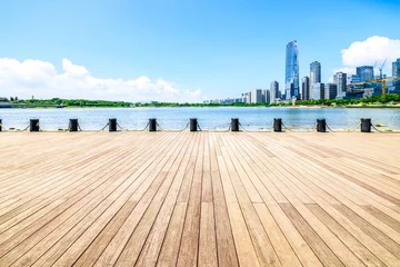 Photo sur Plexiglas Descente vers la plage Empty boardwalk and modern buildings skyline in Shenzhen