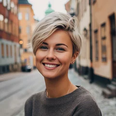 Fototapete Rund Portrait of beautiful blonde scandinavian  woman model on the street of  Stockholm  © Bogna