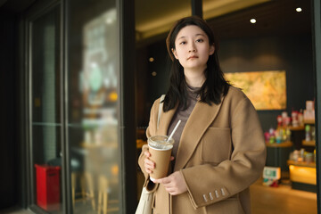 Elegant Woman Enjoying Coffee Break in the City