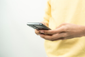 point finger on screen mobile phone closeup, person texting text message, hipster touch blue screen on smartphon