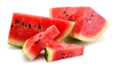 Close-up of watermelon slices against white background - stock photo

