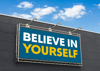  Believe in yourself written on a billboard