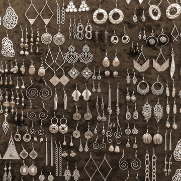 Earrings Market. Jewelry Sale. Jewellery Counter Display. Decorative Texture