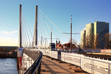 New bridge spans Elbe river in Magdeburg with a tram crossing it - 766287721