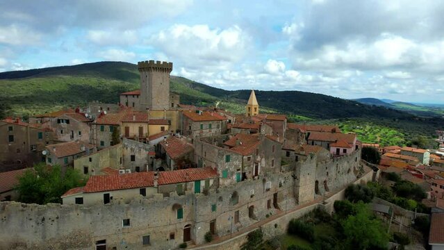 Italy travel and landmarks. Capalbio - charming small traditional top hill village (borgo) in Tuscany. Grosetto province. considered one of the most beautiful villages of Italy. aerial drone HD video