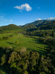 Fototapeta na wymiar Aerial view of rural landscape farms with green patchwork pasture, Chiriqui, panama - stock photo