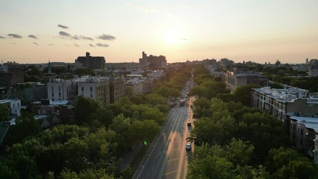 Brooklyn drone footage. Aerial descending footage. Multistorey apartment houses in city. New York City, USA View over the residential district of Bushwick, Brooklyn, at sunset