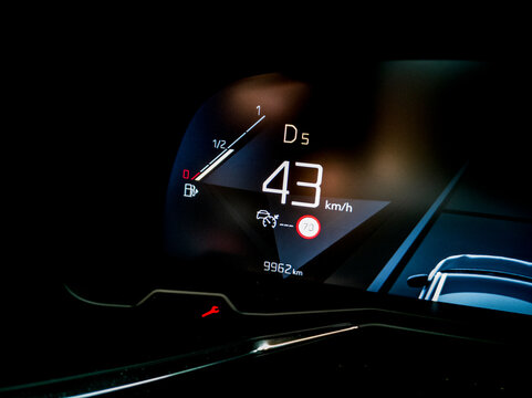 Modern fuel gauge in car dashboard