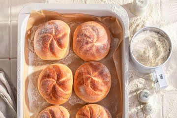 Hot and golden kaiser rolls baked fresh in the bakery. - 766309722