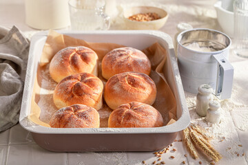 Tasty and homemade kaiser rolls baked fresh in the bakery. - 766310726