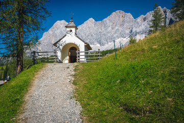 Small alpine chapel in the mountains, Ramsau am Dachstein, Austria - 766312345