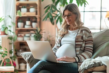 In a home filled with greenery, a focused pregnant woman works on her laptop, radiating a blend of professionalism and maternal warmth. - obrazy, fototapety, plakaty