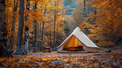 A cozy tent tucked away in an autumnal forest clearing surrounded by golden leaves