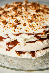 Caramel cake with crunchy caramel and whipped cream