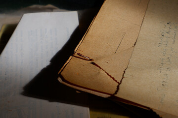 a pile of old paper with a yellowing color, old paper over time, old or worn sheets of paper, old...