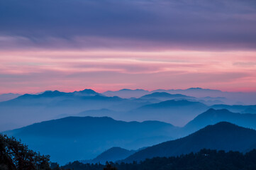 Sunset in the mountains. Dawn Majesty: High-Resolution Mountains with Soothing Natural Colors and...