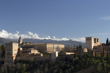Fototapeta na wymiar Alhambra and Sierra Nevada Mountains in background, Granada, Spain