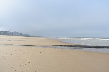 Belgium's coast in winter with sandstorms and sunshine