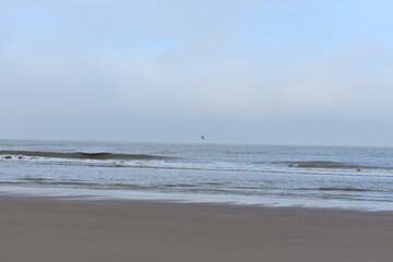 Fototapeta na wymiar Belgium's coast in winter with sandstorms and sunshine