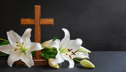 Fototapeta premium Lily of the valley with a wooden cross on a black background