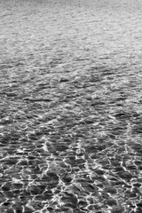 ripples in the water in black and white