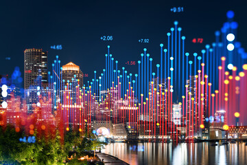 City skyline at night with futuristic hologram graphs overlay. Realism with digital elements on a cityscape background. Double exposure