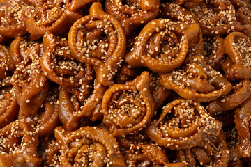 Traditional Moroccan fresh baked chebakia close up for Ramadan full frame as background