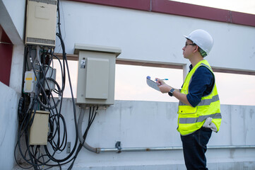 Telecommunication engineers work at cell towers for 5G cell phone signals,Network tower maintenance technicians