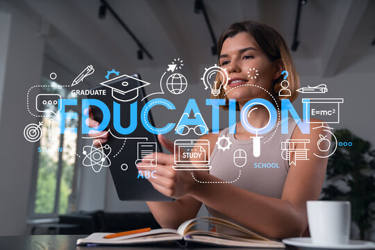 Smiling businesswoman in casual wear holding tablet device touching it at office workplace. Concept of distant work, business education, information technology. Math hologram