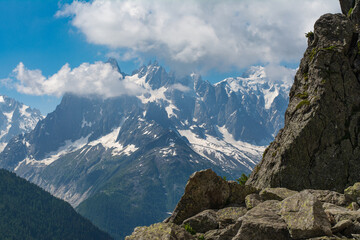 Picturesque view of the Mont Blanc mountain and glacier while hiking Tour du Mont Blanc. Popular tourist attraction. Alps, Chamonix-Mont-Blanc, France, Europe.