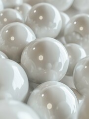 A close up of many white balls, some of which are slightly larger than others. The balls are arranged in a way that creates a sense of depth and texture