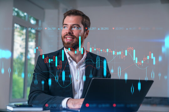 Smiling businessman in formal wear working on laptop at office workplace with smartphone and notebooks. Concept of successful business deal, agreement. Forex chart, financial graph, stock market icons