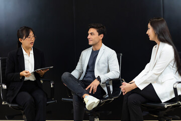 Business interview on stage. TV Show. ceremony is interviewing participants in a business...