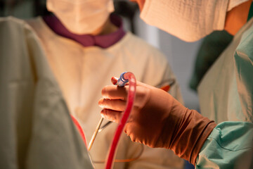 Surgeons perform an operation. Real photos from the operation.