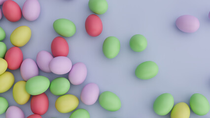 Colorful candy Easter eggs on a pale blue background. 